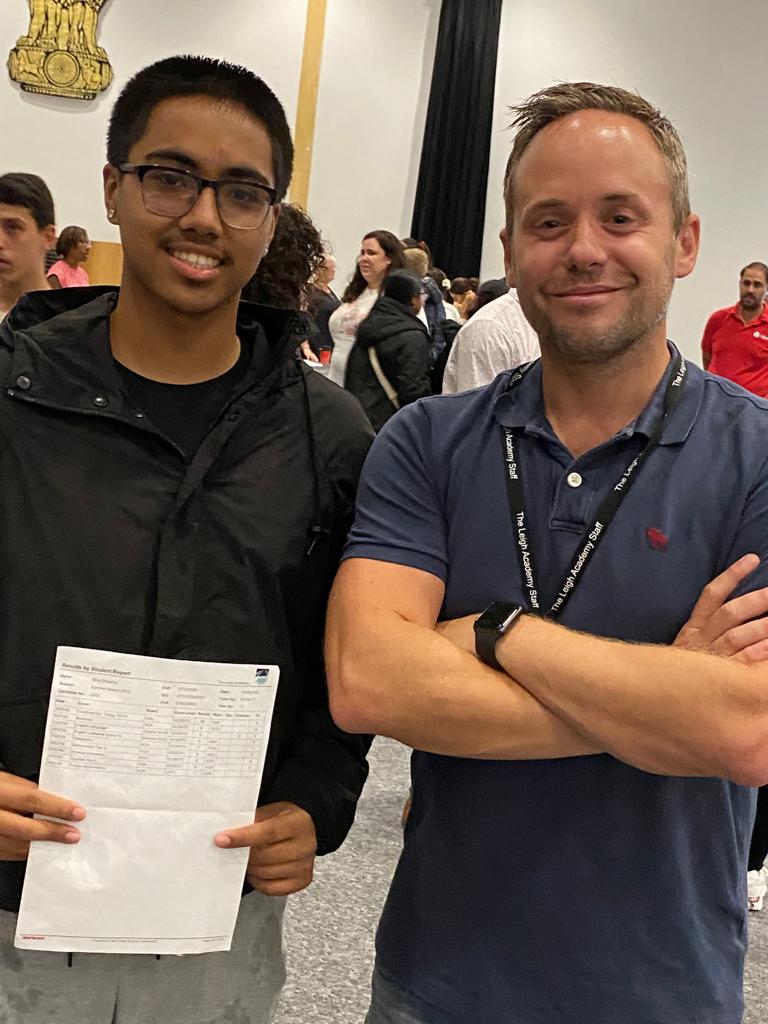 Mr Shepherd is seen smiling for the camera whilst standing alongside Year 11 student, Siraj S, who has just received his results on GCSE Results Day 2022.